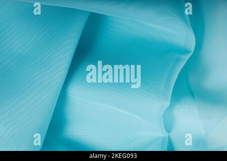 blue silk fabric. wavy fabric texture Stock Photo