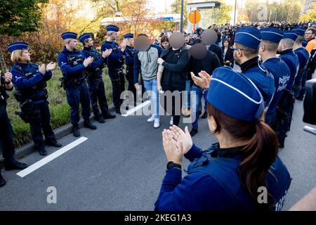 Illustration shows  a guard of honnor for the police officer injured in a stabbing attack last Thursday, as he is leaving hospital, UZ Jette, Saturday 12 November 2022. BELGA PHOTO HATIM KAGHAT Stock Photo