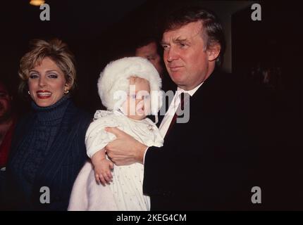 **FILE PHOTO** Tiffany Trump Through the years ahead of her Wedding on Saturday November 12, 2022. Marla Maples Trump and Donald Trump with daughter Tiffany Trump in New York in March 1994. Photo Credit: Henry McGee/MediaPunch Stock Photo