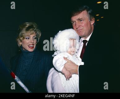 **FILE PHOTO** Tiffany Trump Through the years ahead of her Wedding on Saturday November 12, 2022. Marla Maples Trump and Donald Trump with daughter Tiffany Trump outside the Minskoff Theatre in New York City in March 29, 1994. Photo Credit: Henry McGee/MediaPunch Stock Photo