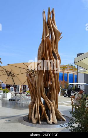 Milan, Italy - June 29, 2015: The wooden sculpture of Uruguay sculptor Pablo Atchugarry resident in Italy. The statue is called 'Life after life'. Stock Photo