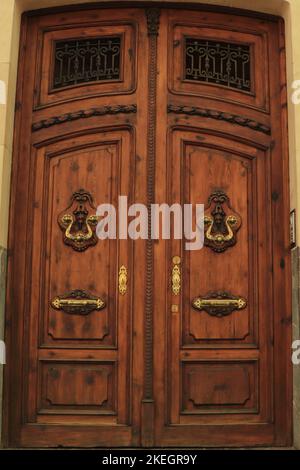 Beautiful Brass Doorknocker on Wooden Door in Palma Spain Stock Photo