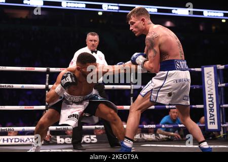 Kaisee Benjamin (left) in action against Dalton Smith in the BBBofC British Super Light bout at the AO Arena, Manchester. Issue date: Saturday November 12, 2022. Stock Photo