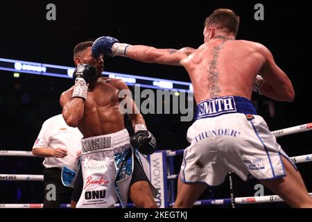 Kaisee Benjamin (left) in action against Dalton Smith in the BBBofC British Super Light bout at the AO Arena, Manchester. Issue date: Saturday November 12, 2022. Stock Photo
