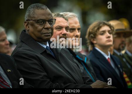 Washington, United States Of America. 11th Nov, 2022. Washington, United States of America. 11 November, 2022. U.S. Secretary of Defense Lloyd J. Austin III, left, sits with Secretary of the Veterans Administration, Denis McDonough, center, during the Veterans Day Observance at the Vietnam Veterans Memorial, November 11, 2022 in Washington, DC The day marked the 40th anniversary of the memorial dedication. Credit: Chad J. McNeeley/DOD Photo/Alamy Live News Stock Photo
