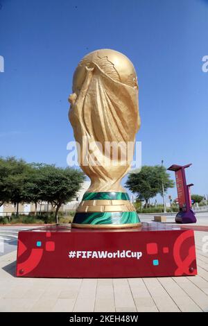 Doha, Qatar. 12th Nov, 2022. A Replica of the FIFA Cup is placed at the entrance of the Education city Stadium, Education City Stadium Qatar, is one of the playing venues of the FIFA World Cup Qatar 2022, the venue will host six group stage matches, one round of 16 and one quarter-final games. November 12, 2022 in Doha, Qatar. (Credit Image: © Sidhik Keerantakath/eyepix via ZUMA Press Wire) Stock Photo