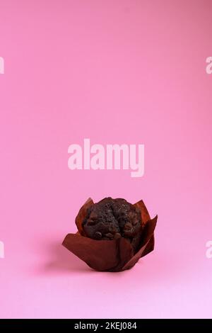 chocolate chip muffin isolated on pink background  Stock Photo