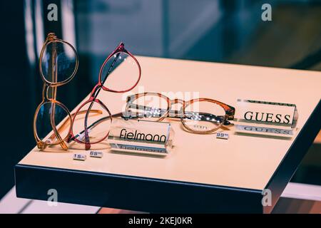 26 July 2022, Munster, Germany: Fashionable and stylish glasses on the counter of the optics store Stock Photo