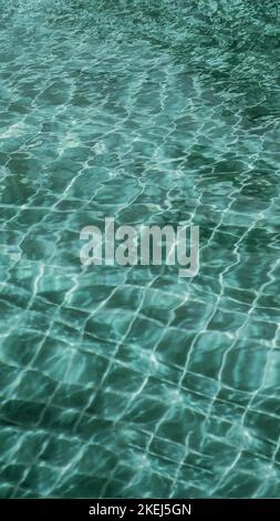 Abstract background Patterns Ripped water Surface swimming pool Light Reflection Vibrant blue green Stock Photo