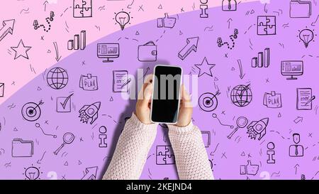 Smartphone in the hands of a person. Various icons as symbols of programs to use. Stock Photo