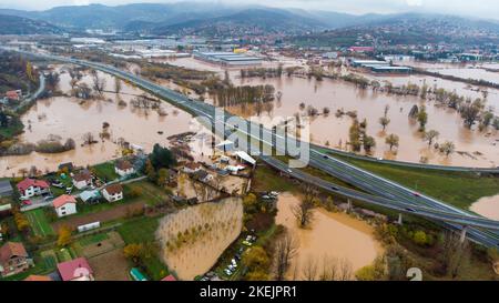 Aerial drone view of torrential rain causes flash floods in residential ...