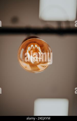 Light bulb illuminated and taken from above Stock Photo - Alamy