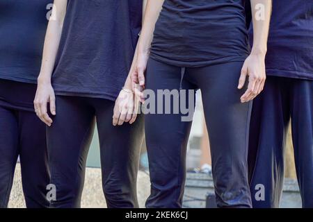 unrecognizable women actresses dressed in black representing fear Stock Photo