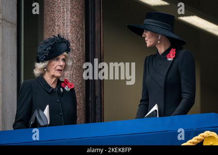 The Queen Consort and the Princess of Wales stand on a balcony at the Foreign, Commonwealth and Development Office (FCDO) on Whitehall, during the Remembrance Sunday service at the Cenotaph in London. Picture date: Sunday November 13, 2022. Stock Photo