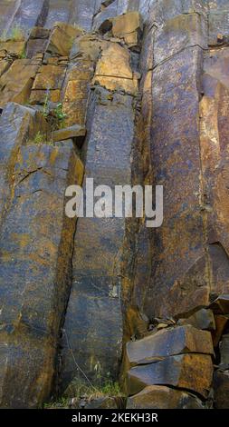 Background from natural material of basalt stones Stock Photo