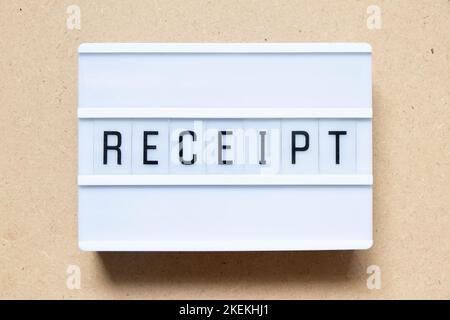Lightbox with word receipt on wood background Stock Photo