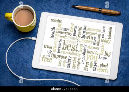 copywriting power words - word cloud on a digital tablet, flat lay with a cup of coffee, marketing and communication concept Stock Photo
