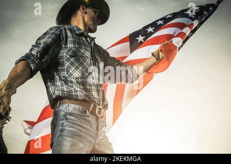 American Proud Patriotic Caucasian Cowboy Waving United States of America National Flag Stock Photo