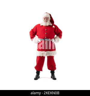 Santa Claus with hands on belly holding his hands on belt, isolated on white background. Stock Photo