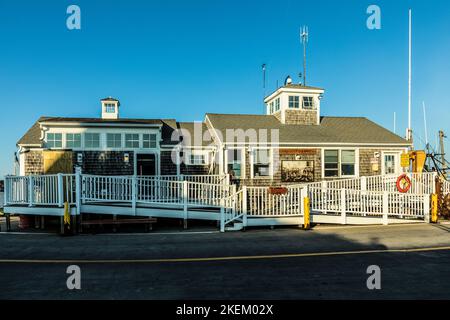 Provinvetown, USA - September 24, 2017: romantic view to ships from Pier in Provincetown in sunset Stock Photo