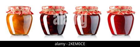 collection of fruit jam in jars covered with paper isolated on white Stock Photo