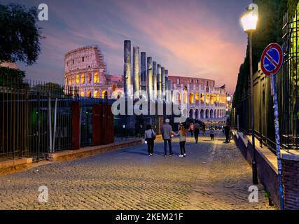 Rome Lazio Italy. The Colosseum (Colosseo), an oval amphitheatre in the centre of the city, seen from the Via Sacra (Sacred Street) Stock Photo