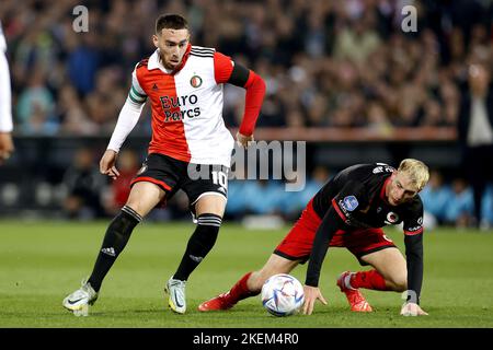 ROTTERDAM - (lr) Orkun Kokcu of Feyenoord, Joshua Eijgenraam or sbv Excelsior during the Dutch Eredivisie match between Feyenoord and Excelsior at Feyenoord Stadium de Kuip on November 13, 2022 in Rotterdam, Netherlands. ANP PIETER STAM DE YOUNG Stock Photo