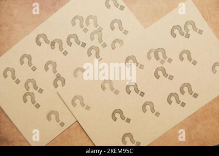 high angle view of many question marks on paper  Stock Photo