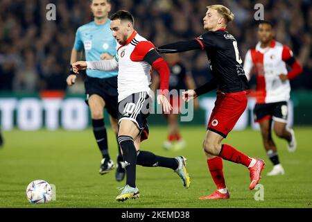 ROTTERDAM - (lr) Orkun Kokcu of Feyenoord, Joshua Eijgenraam or sbv Excelsior during the Dutch Eredivisie match between Feyenoord and Excelsior at Feyenoord Stadium de Kuip on November 13, 2022 in Rotterdam, Netherlands. ANP PIETER STAM DE YOUNG Stock Photo