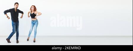Banner social dance concept - Crazy dancing, cheerful couple over white background copy space Stock Photo