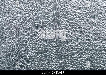 Droplets on a misted window as a background Stock Photo