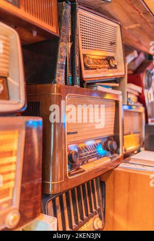 Old radio's stacked on each other Stock Photo