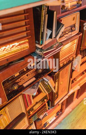 Old radio's stacked on each other Stock Photo