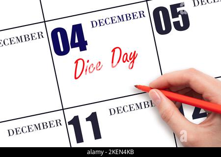 December 4th. Hand writing text Dice Day on calendar date. Save the date. Holiday. Day of the year concept. Stock Photo