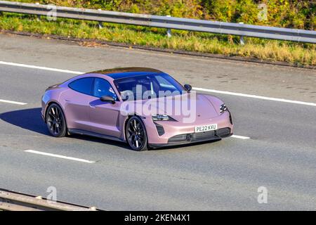 2022  Rubystar PORSCHE all-electric sports car travelling on the M6 motorway UK. Stock Photo