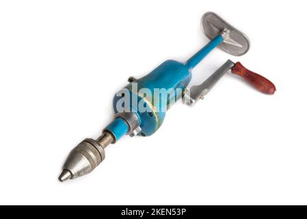 Retro drill on the crank on a white Stock Photo