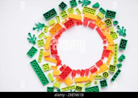 Multicolored plastic building blocks of the designer. Educational developing toys background.copz space Stock Photo
