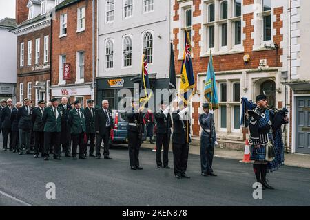 Hereford, UK. 13th Nov, 2022. The start of the parade on St Owens Street. Hereford marks Remembrance Sunday on the 100th anniversary of the Eleanor Cross in St Peters Square. Designed in the form of an Eleanor Cross, the 30ft high Memorial was unveiled and dedicated on 7th October, 1922 in commemoration of about 2000 Herefordshire service men and women who gave their lives in the 1914-1918 War. Credit: SOPA Images Limited/Alamy Live News Stock Photo