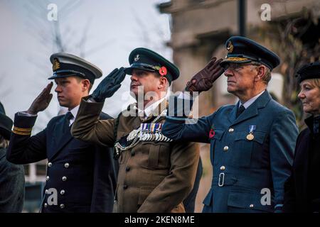 Hereford, UK. 13th Nov, 2022. Members of the Armed Forces make salutes. Hereford marks Remembrance Sunday on the 100th anniversary of the Eleanor Cross in St Peters Square. Designed in the form of an Eleanor Cross, the 30ft high Memorial was unveiled and dedicated on 7th October, 1922 in commemoration of about 2000 Herefordshire service men and women who gave their lives in the 1914-1918 War. (Photo by Jim Wood/SOPA Images/Sipa USA) Credit: Sipa USA/Alamy Live News Stock Photo