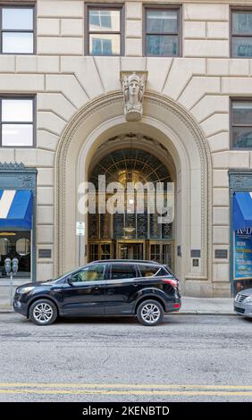 The historic Leader-News Building once housed two Cleveland newspapers. The beaux arts high-rise now holds apartments, offices, and retail shops. Stock Photo