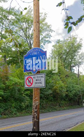 A street sign in Little Italy proclaims Cleveland as 'Forest City.' Stock Photo