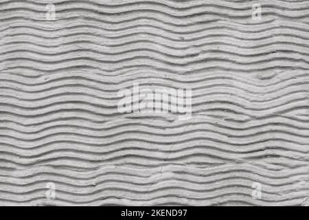 Abstract curvy cement pattern with waves on a plastered wall. Creative background Stock Photo