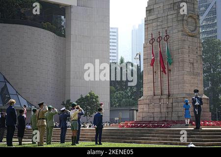 Hong Kong, China. 13th Nov, 2022. People attend the ceremony in front of the Cenotaph during the remembrance day. Hundreds of people gathered in front of the Cenotaph in Central to commemorate those who lost their lives during the two world wars. Credit: SOPA Images Limited/Alamy Live News Stock Photo