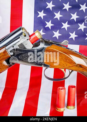 American flag and fancy shotgun with shells Stock Photo