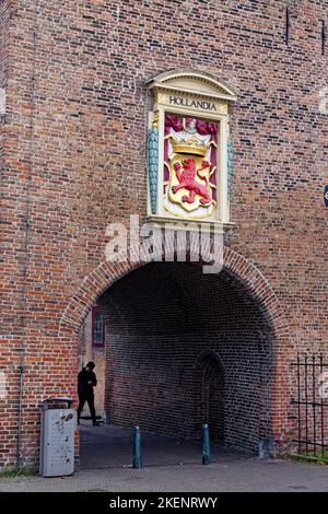 The Hague, Netherlands. 31th Oct 2022. Prison gate Gevangenpoort museum with coat of arms in The Hague, Netherlands. Stock Photo