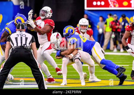 Inglewood, CA. 13th Nov, 2022. Los Angeles Rams quarterback John Wolford #13  scarambles and is brought down by Arizona Cardinals defensive end Zach  Allen #94 in action in the fourth quarter during