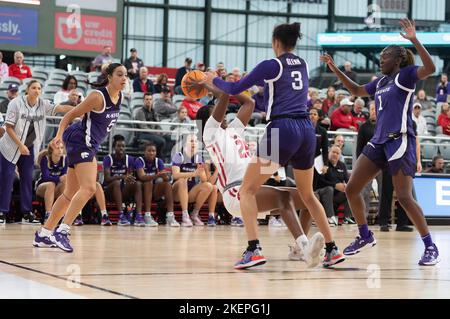 Milwaukee, WI, USA. 11th Nov, 2022. Wisconsin Badgers forward Serah Williams #25 shoots while falling back against Kansas State Wildcats guard Jaelyn Glenn #3, Kansas State Wildcats guard Brylee Glenn #5, and Kansas State Wildcats forward Sarah Shematsi #1 during NCAA basketball game between the Kansas State Wildcats and the Wisconsin Badgers at American Family Field in Milwaukee, WI. Kansas State defeated Wisconsin 77-63.Kirsten Schmitt/CSM/Alamy Live News Stock Photo