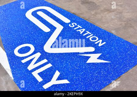 Parking symbols for charged electric cars Stock Photo