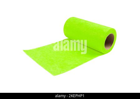 Green microfiber cloth for cleaning in a roll isolated on white background with clipping path. Roll towels for kitchen Stock Photo