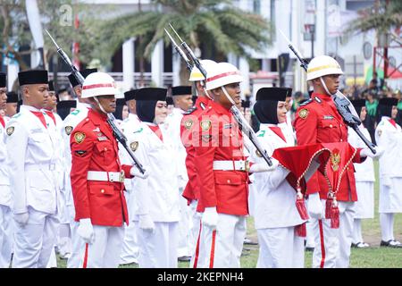 Indonesian flag raiser (paskibraka) in independence day ceremony Stock Photo